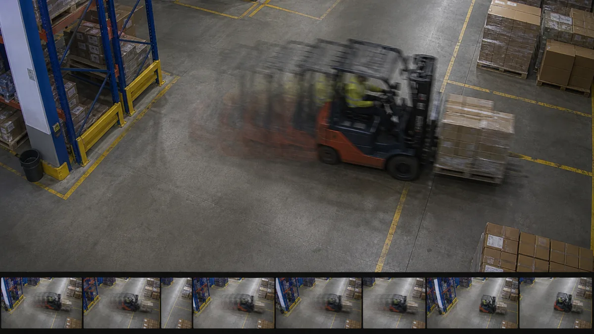 FPS drift degradation in a warehouse forklift lane CCTV view, with ghosted forklift positions showing irregular cadence.